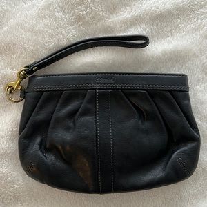 Coach Brand clutch with detachable wristlet. Black leather.